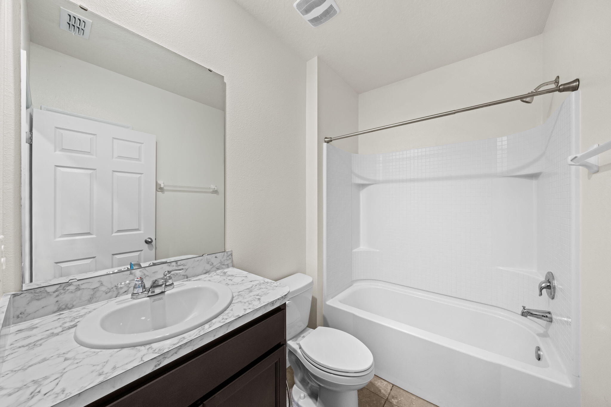 820 Forest Trace Circle Titusville, FL 32780 - Photo 22 of 27 a bathroom with a granite countertop sink toilet and shower