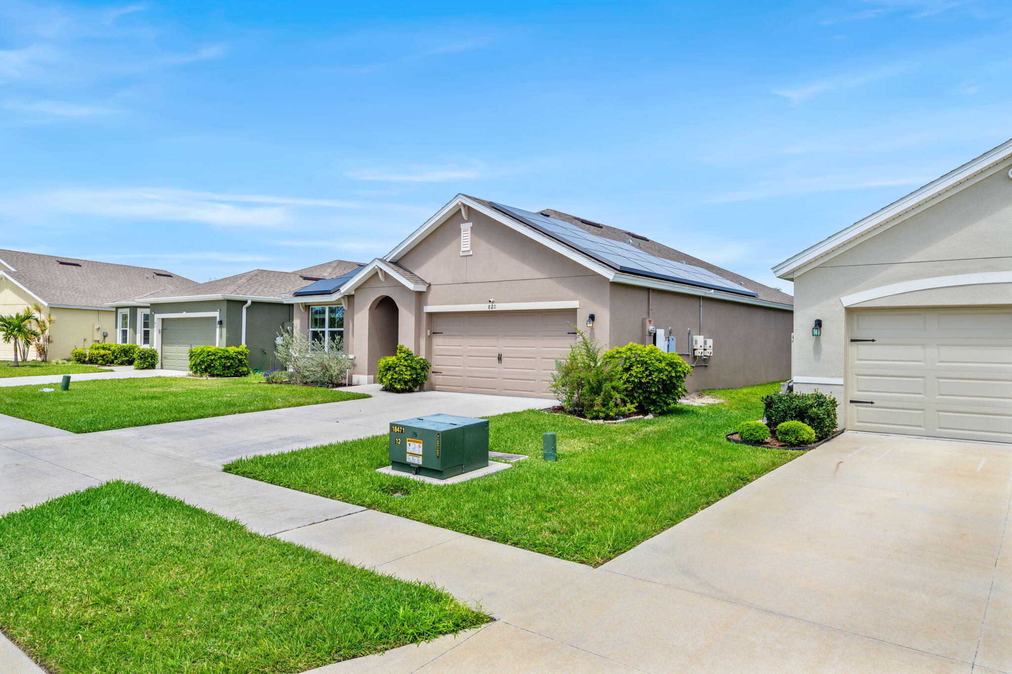 820 Forest Trace Circle Titusville, FL 32780 - Photo 3 of 27 a front view of a house with garden