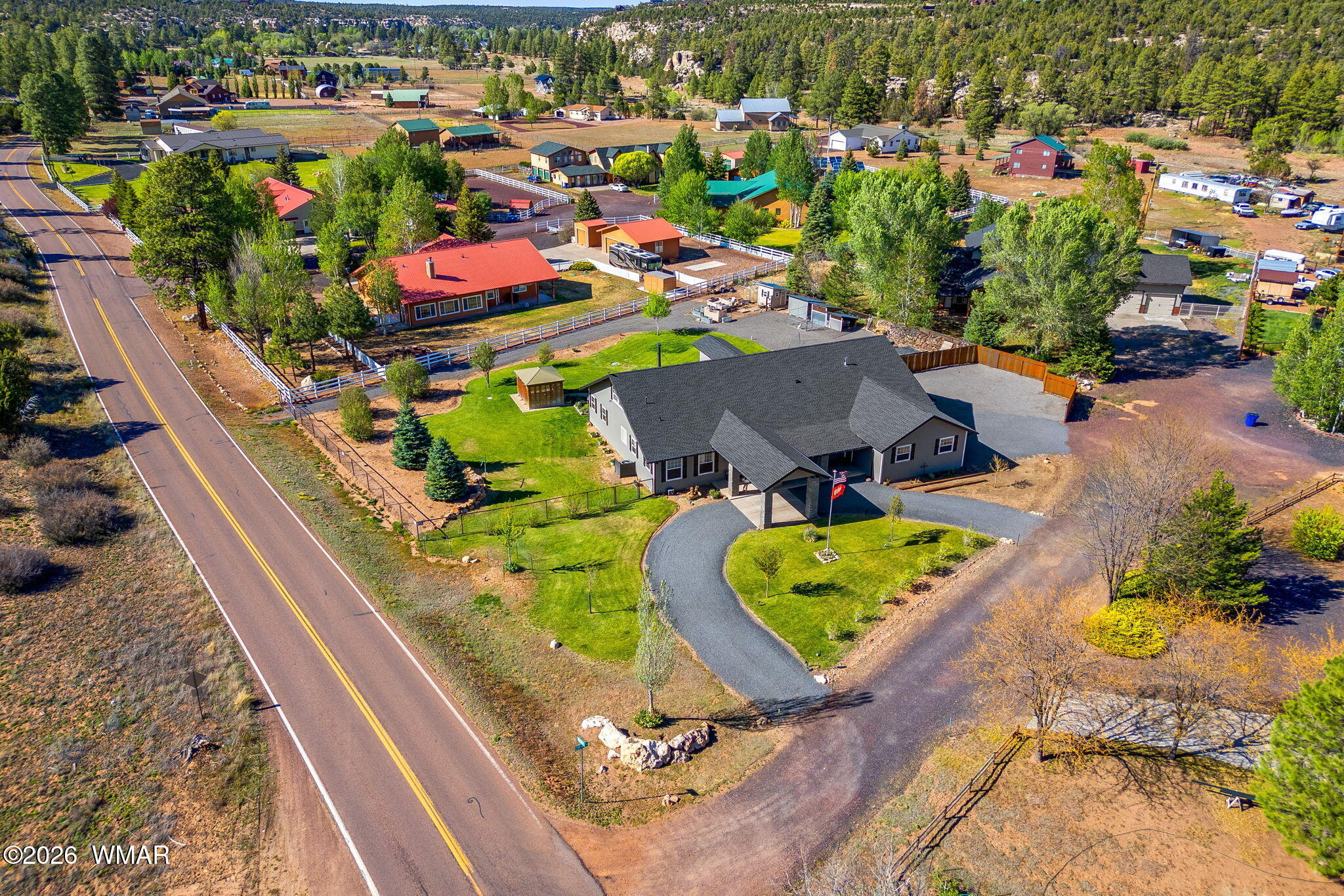 1940 Stonegate Way Heber, AZ 85928 - Photo 57 of 62 an aerial view of a house with a swimming pool yard and outdoor seating
