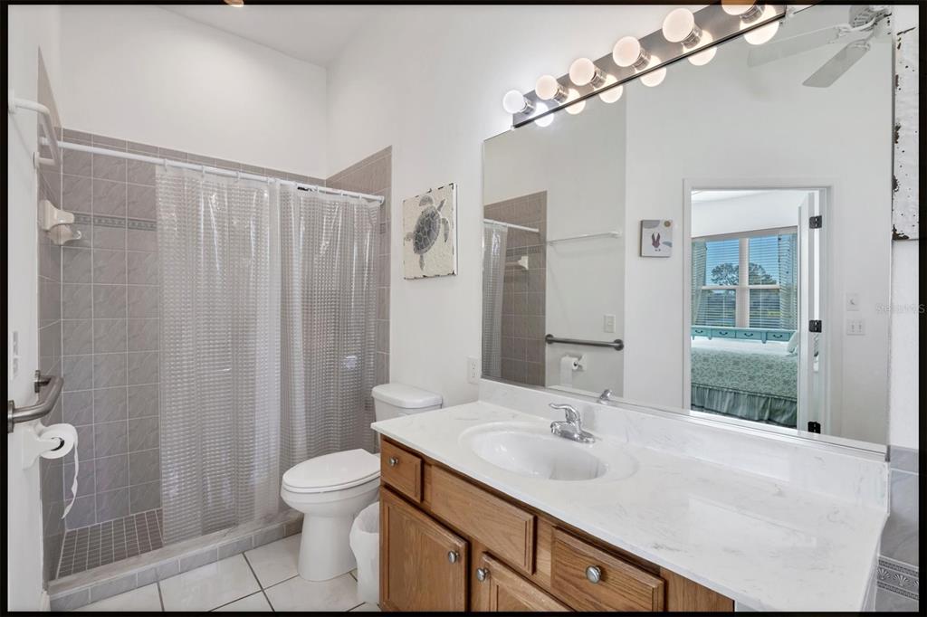 4115 Hemingway Drive Venice, FL 34293 - Photo 20 of 41 a bathroom with a sink toilet and shower