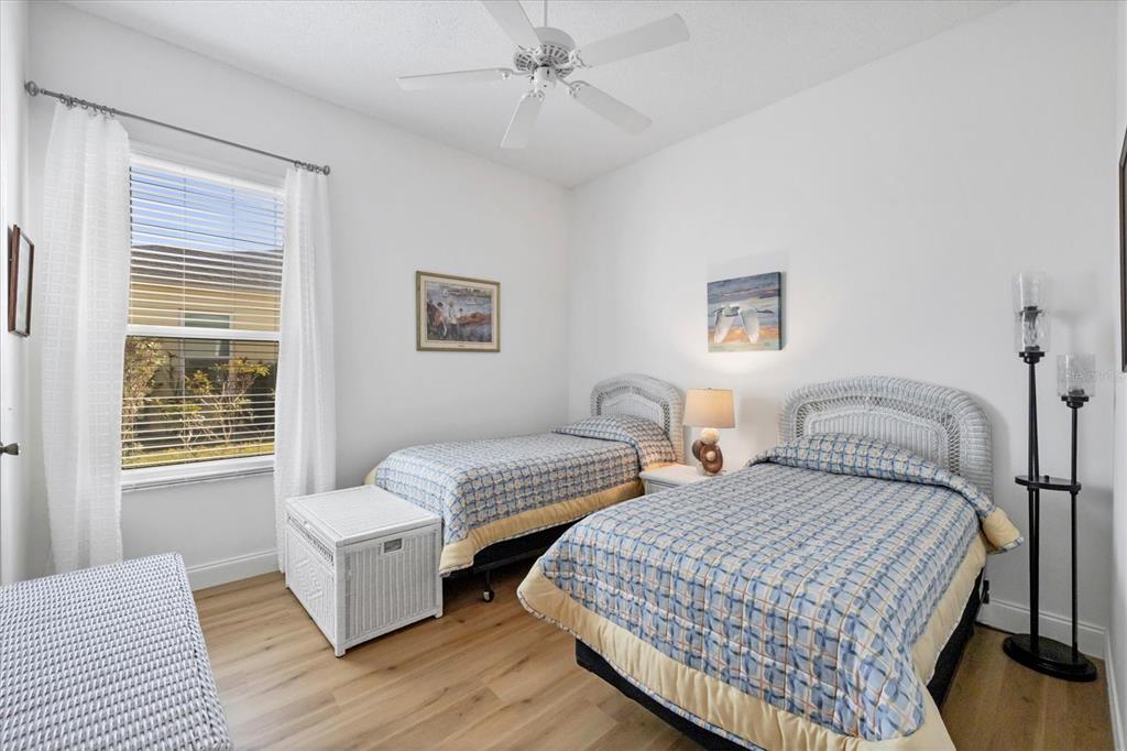 4115 Hemingway Drive Venice, FL 34293 - Photo 24 of 41 a bedroom with two beds and a window