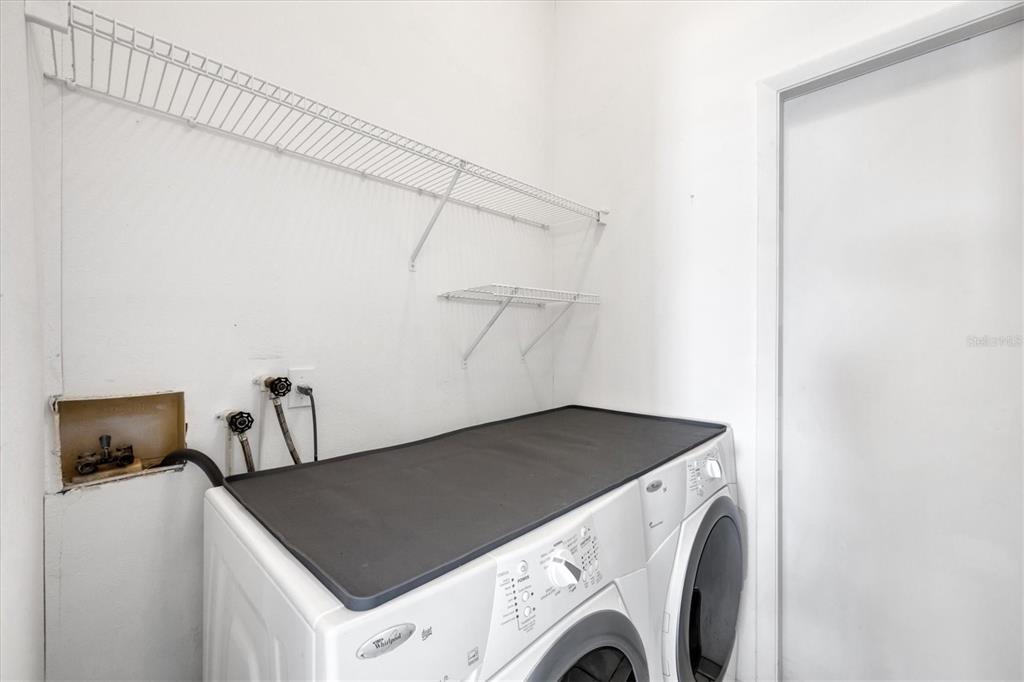 4115 Hemingway Drive Venice, FL 34293 - Photo 25 of 41 a utility room with dryer and washer
