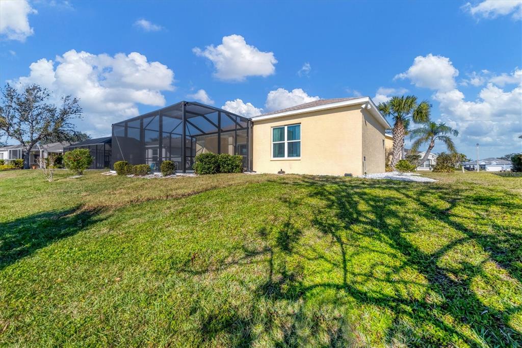 4115 Hemingway Drive Venice, FL 34293 - Photo 33 of 41 a view of a house with a yard