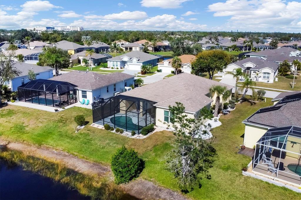 4115 Hemingway Drive Venice, FL 34293 - Photo 35 of 41 an aerial view of a house with a garden
