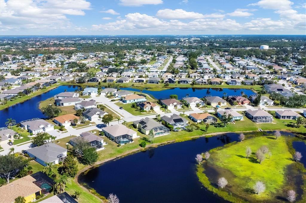 4115 Hemingway Drive Venice, FL 34293 - Photo 36 of 41 an aerial view of a residential houses with outdoor space