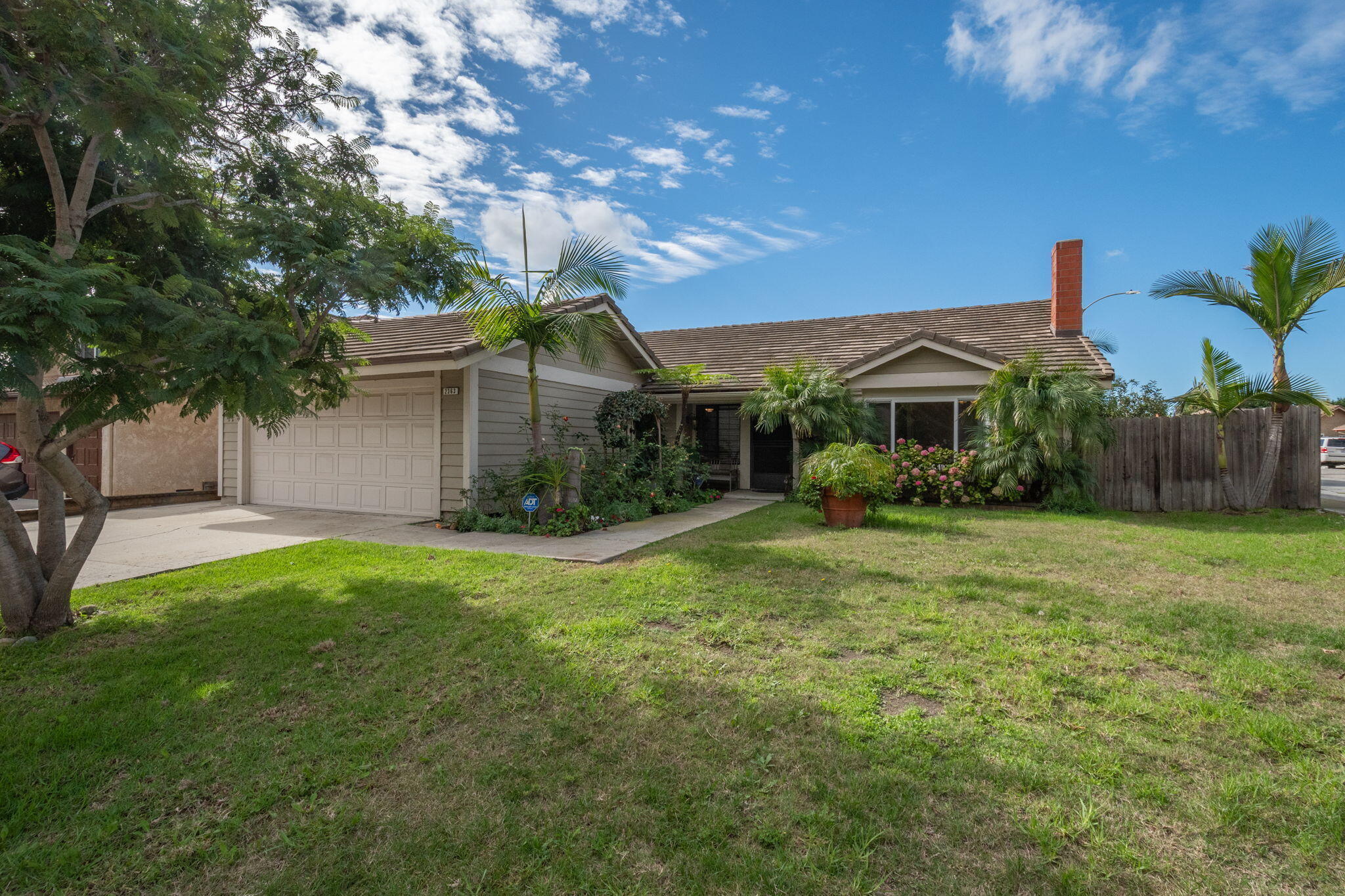 2363 Seagull Avenue Ventura, CA 93003 - Photo 1 of 37 a view of a house with backyard and a tree
