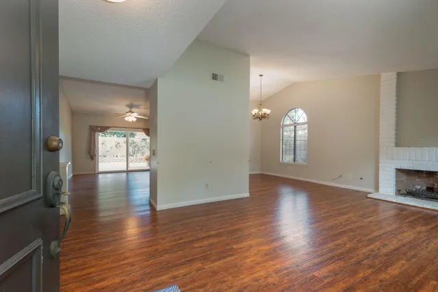 a view of a livingroom with wooden floor