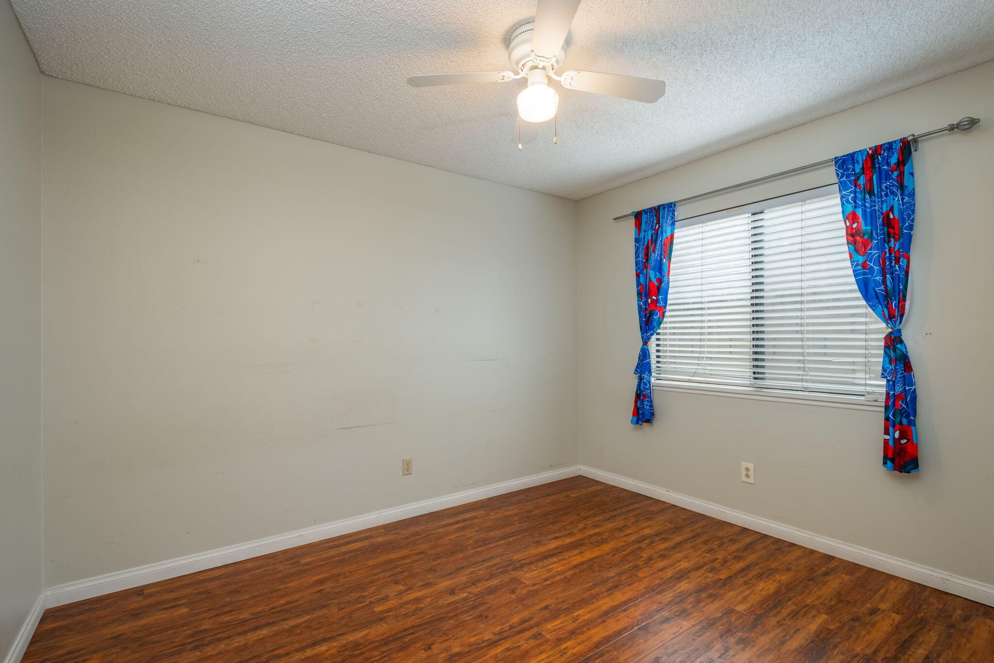2363 Seagull Avenue Ventura, CA 93003 - Photo 24 of 37 wooden floor in an empty room with a window