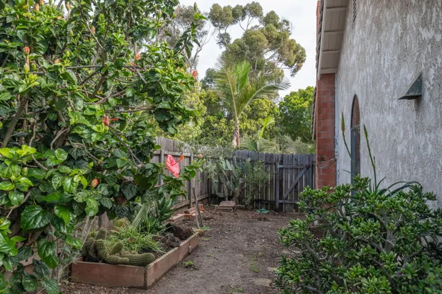 a backyard of a house with lots of green space