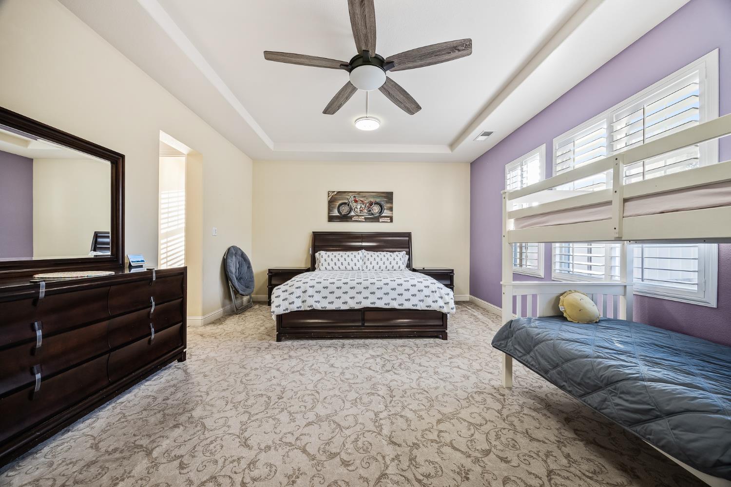 4183 North Bodega Bay Road Clovis, CA 93619 - Photo 15 of 30 a spacious bedroom with a bed and window