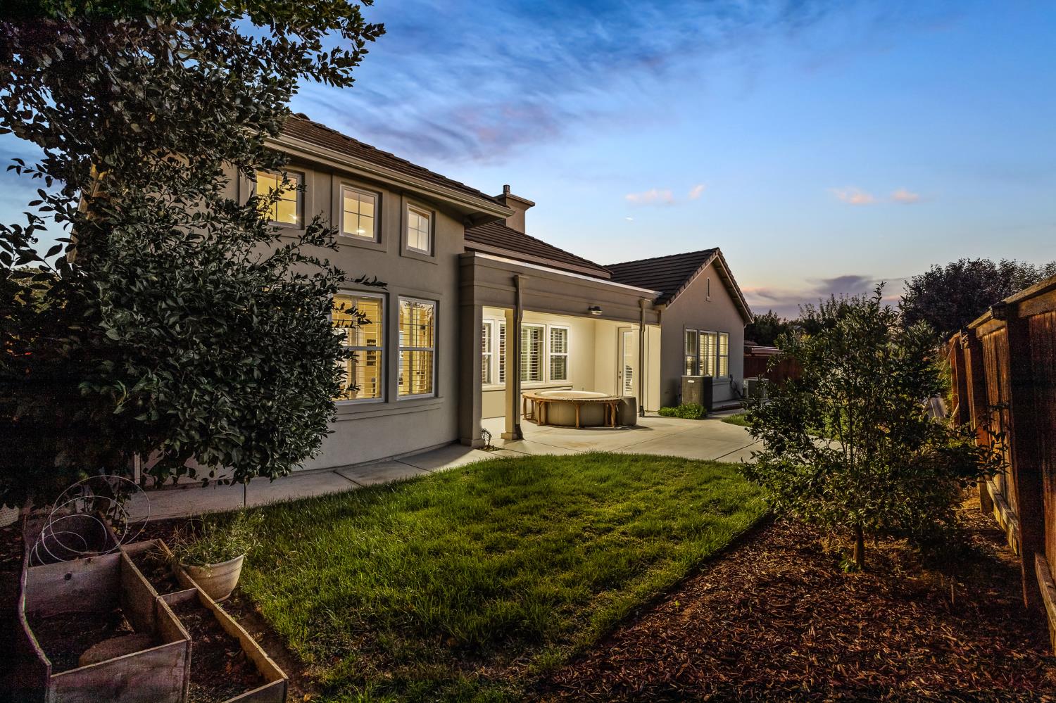 4183 North Bodega Bay Road Clovis, CA 93619 - Photo 26 of 30 a front view of a house with garden