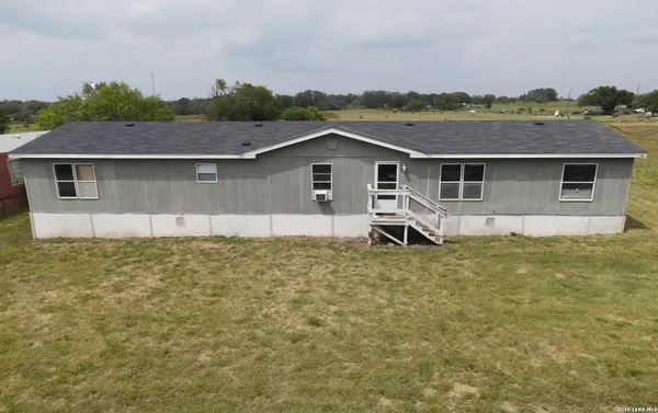 $95,000 | 517 Corley Drive, Devine, TX 78016