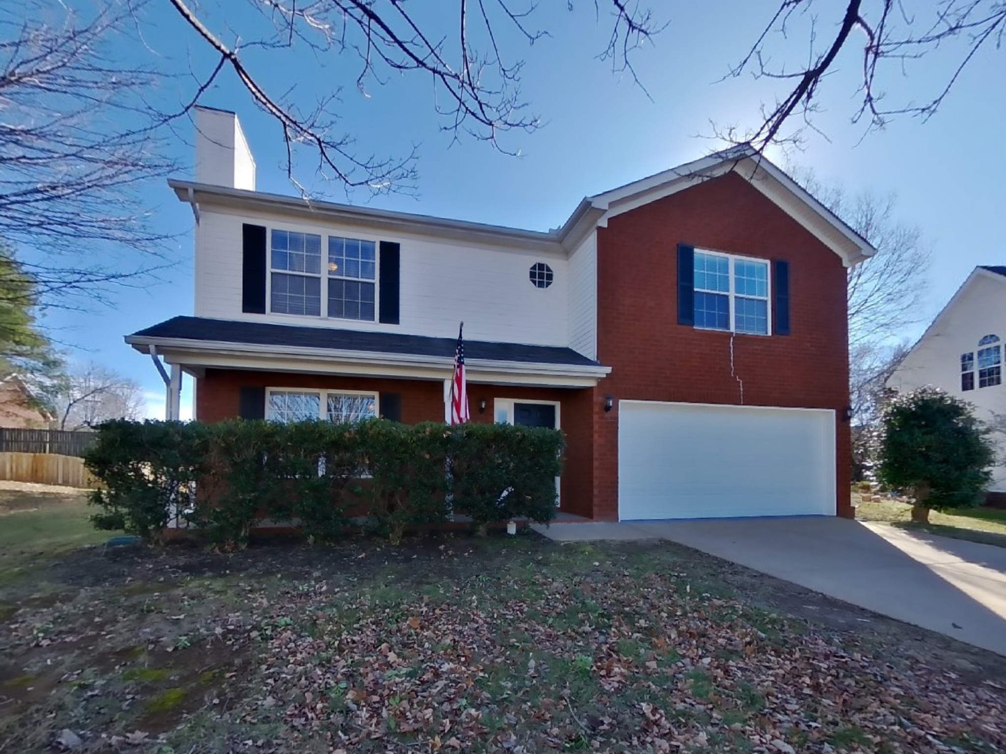 a front view of house with yard