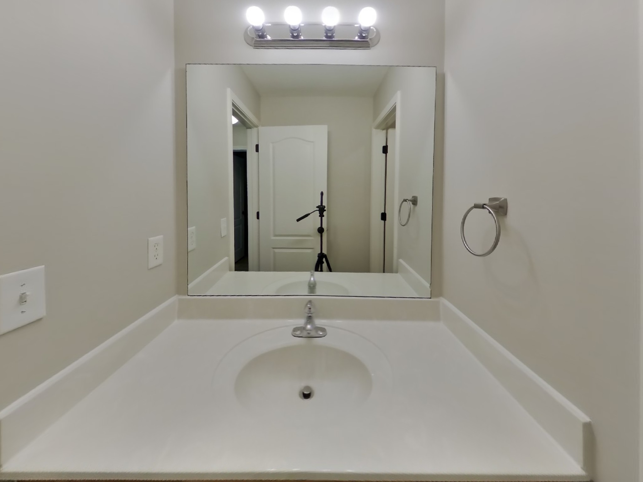 1940 Portway Road Spring Hill, TN 37174 - Photo 17 of 21 a bathroom with a granite countertop sink a toilet and mirror