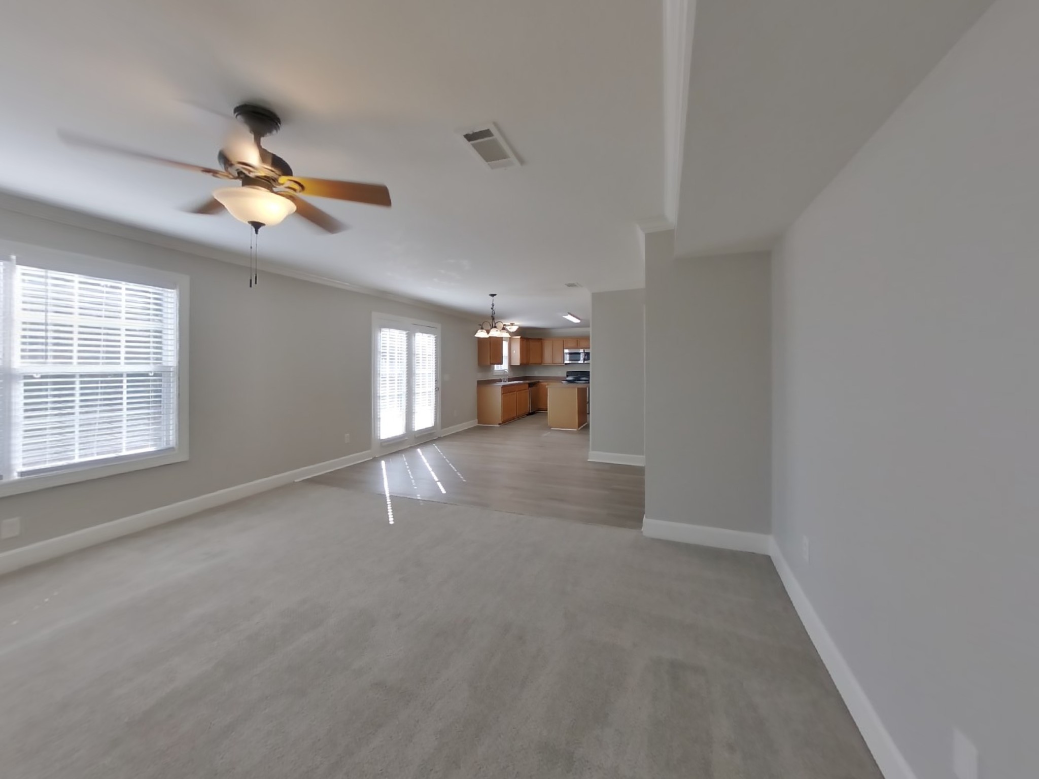 1940 Portway Road Spring Hill, TN 37174 - Photo 20 of 21 a view of a livingroom with a ceiling fan and window