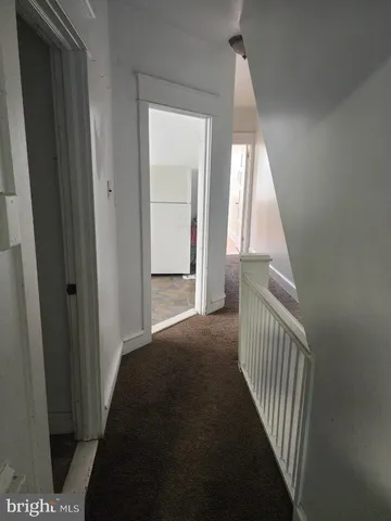 a view of a hallway view with windows