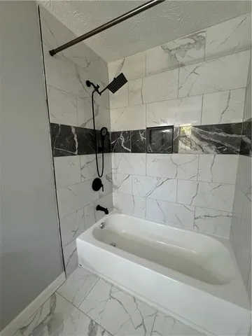 a bathroom with a bathtub