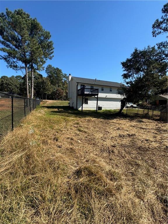 2911 Highpoint Road Snellville, GA 30078 - Photo 20 of 28 a view of a backyard of the house