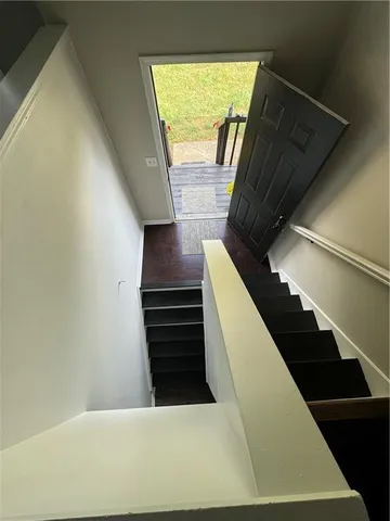 a view of entryway and kitchen