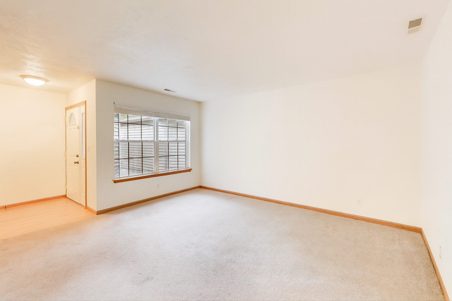150 North Wooster Street, Unit 2 Capron, IL 61012 - Photo 9 of 17 a view of an empty room with a window