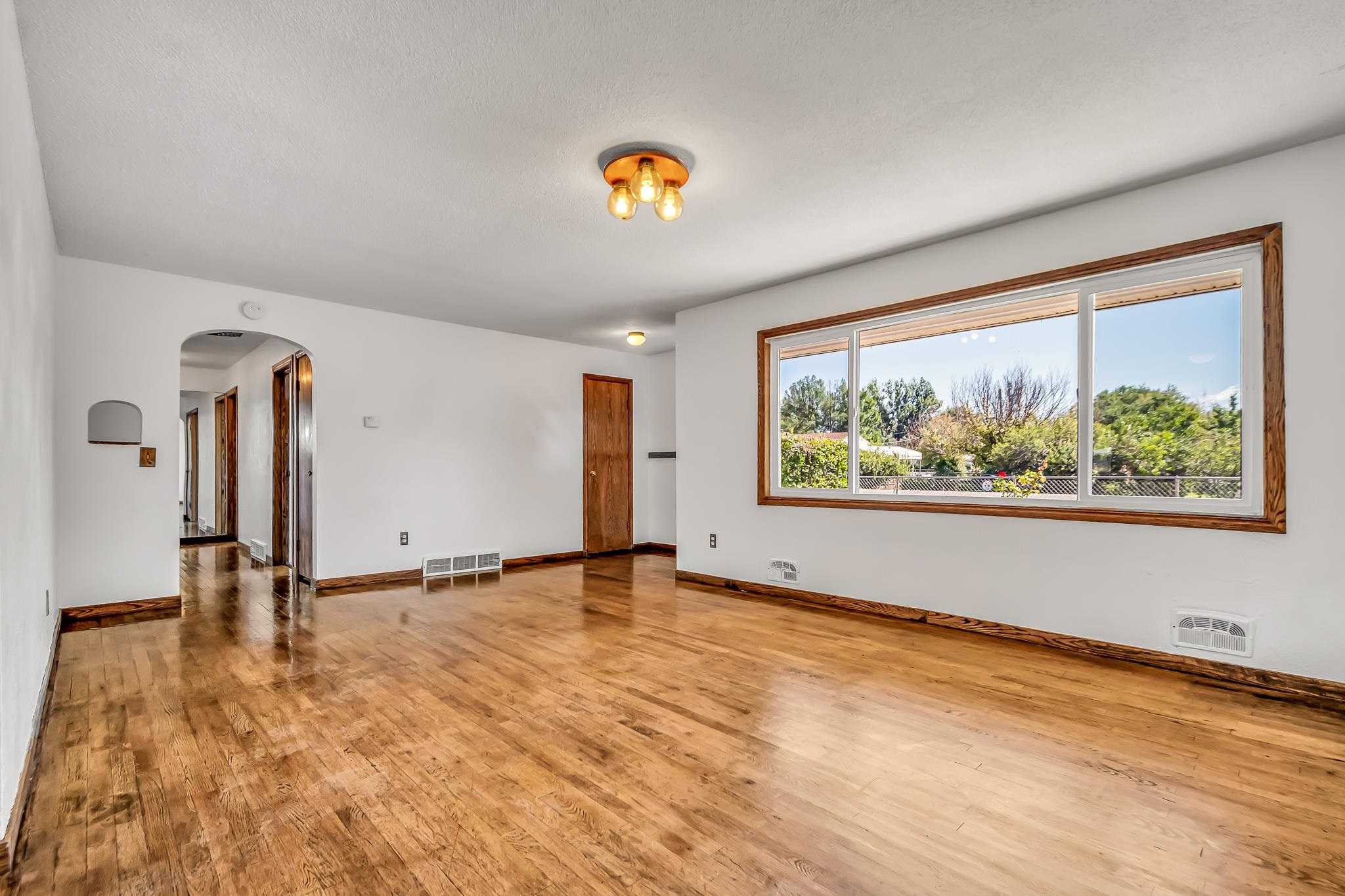 253 Nancy Street Grand Junction, CO 81503 - Photo 12 of 26 a view of an empty room with a window