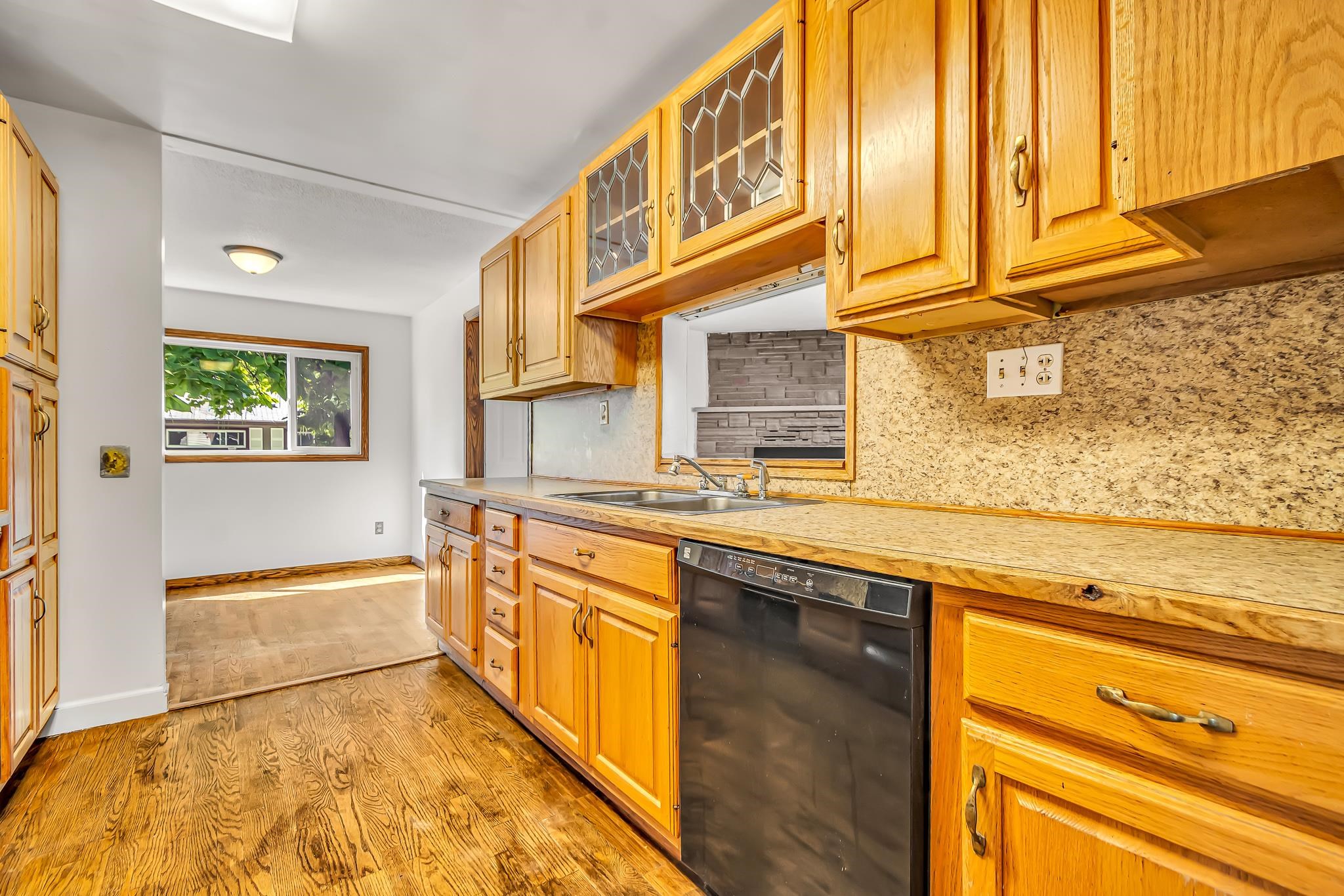 253 Nancy Street Grand Junction, CO 81503 - Photo 14 of 26 a view of a kitchen counter top space and windows