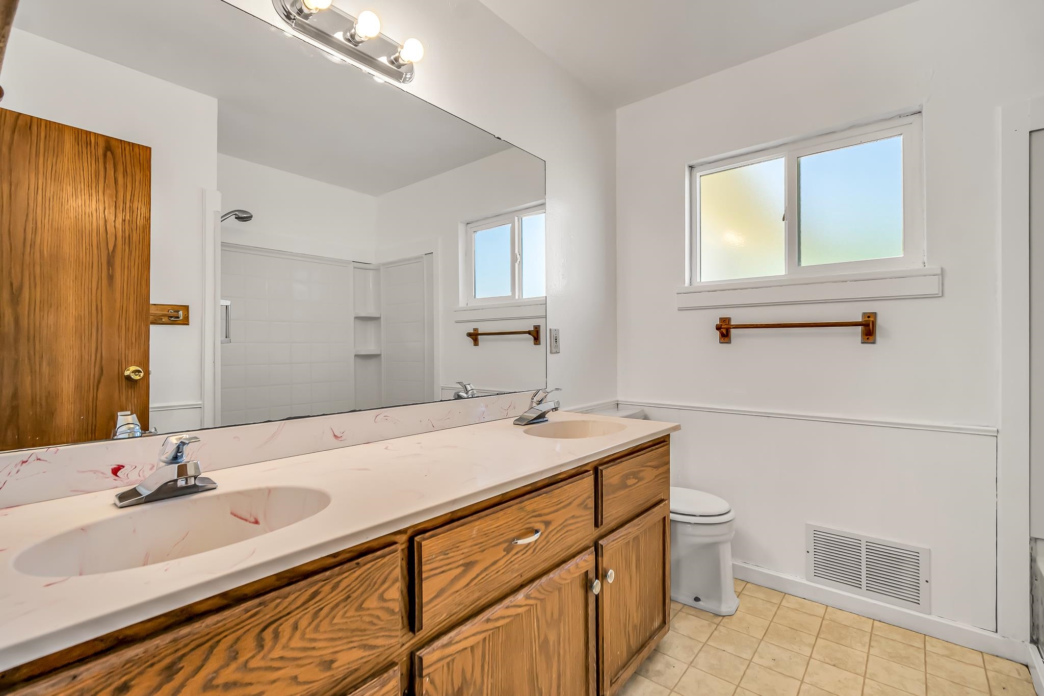 253 Nancy Street Grand Junction, CO 81503 - Photo 18 of 26 a bathroom with a sink and a mirror