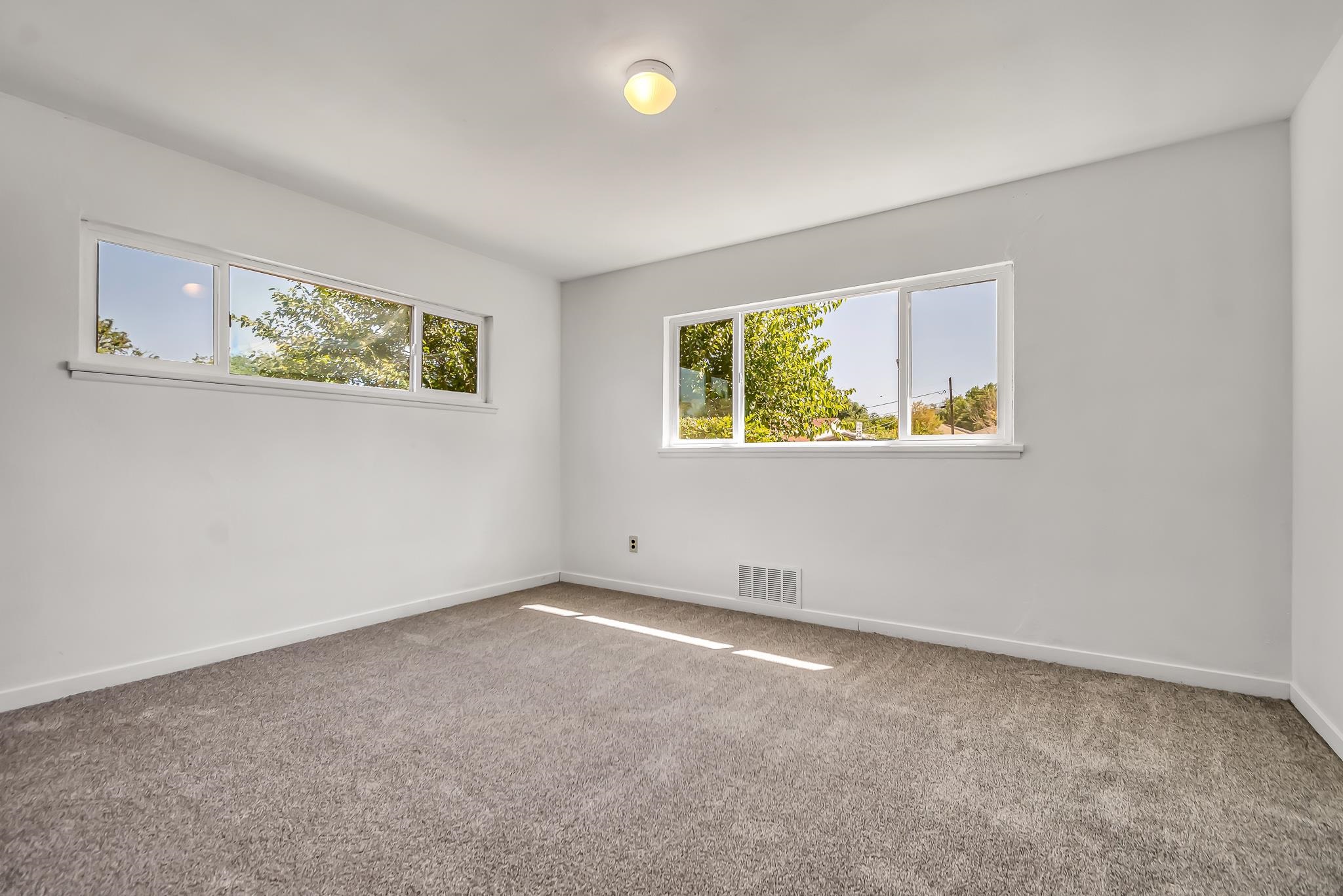 253 Nancy Street Grand Junction, CO 81503 - Photo 22 of 26 an empty room with windows