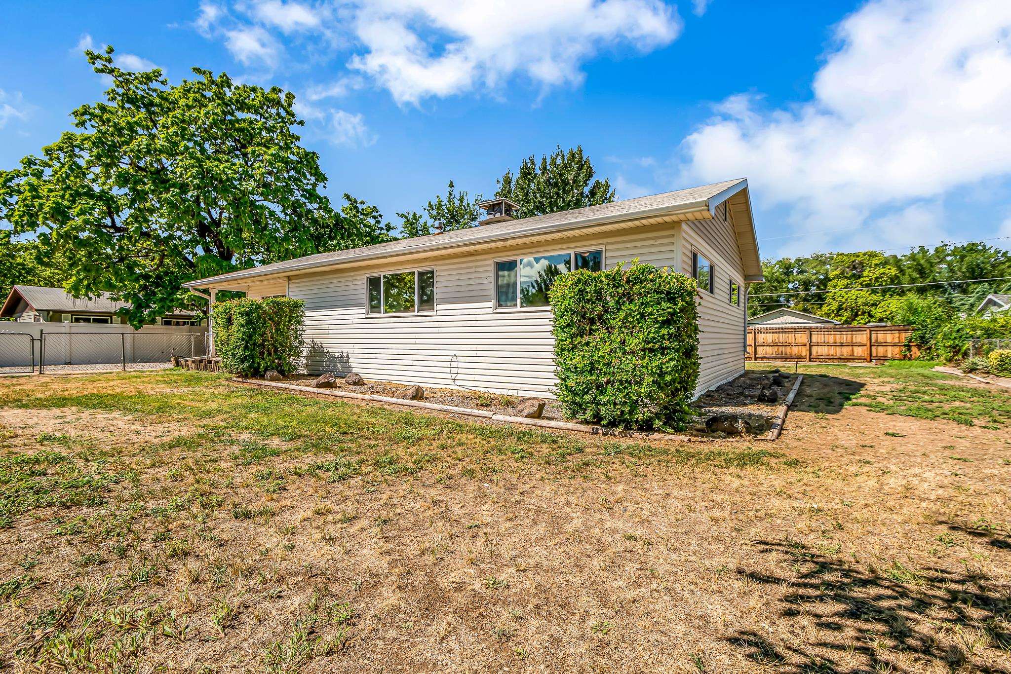 253 Nancy Street Grand Junction, CO 81503 - Photo 5 of 26 a view of a house with a yard