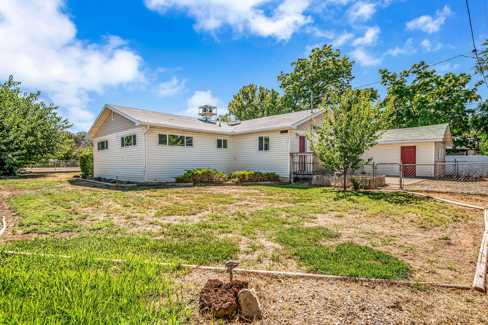 253 Nancy Street Grand Junction, CO 81503 - Photo 6 of 26 a view of a house with a yard