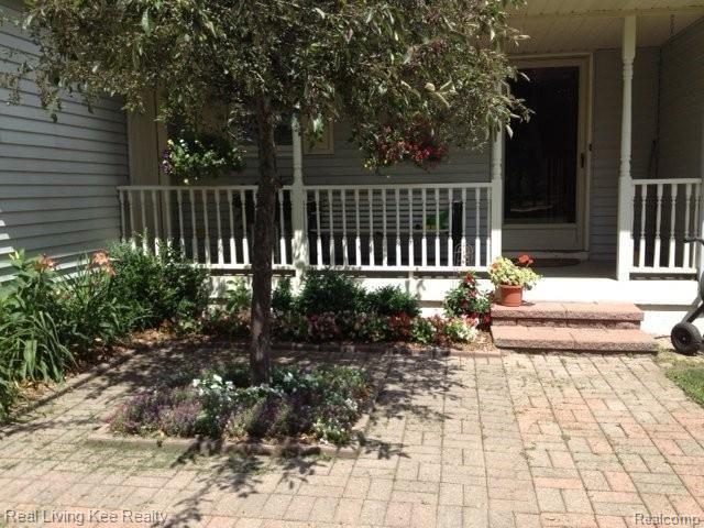 881 Brewer Road Leonard, MI 48367 - Photo 3 of 25 Front Porch