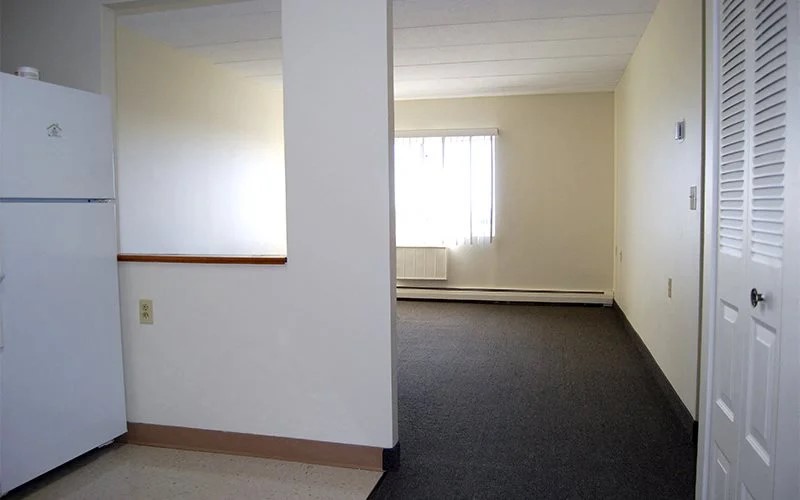 20 Kelly Street Providence, RI 02909 - Photo 6 of 10 an empty room with a door