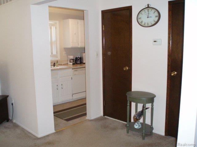 5075 Crooks Road, Unit 9 Royal Oak, MI 48073 - Photo 8 of 9 Hall to Kitchen