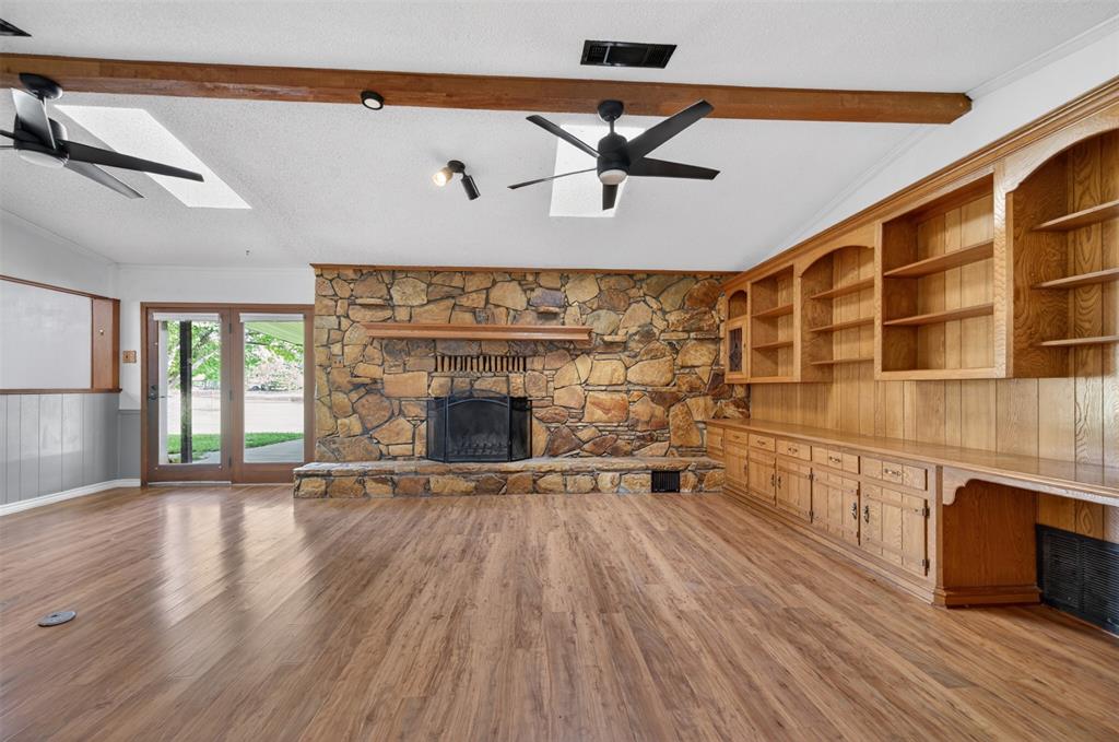 106 Snyder Ranch Road Trinidad, TX 75163 - Photo 10 of 40 Living room with massive stone wood-burning fireplace and lots of built-ins