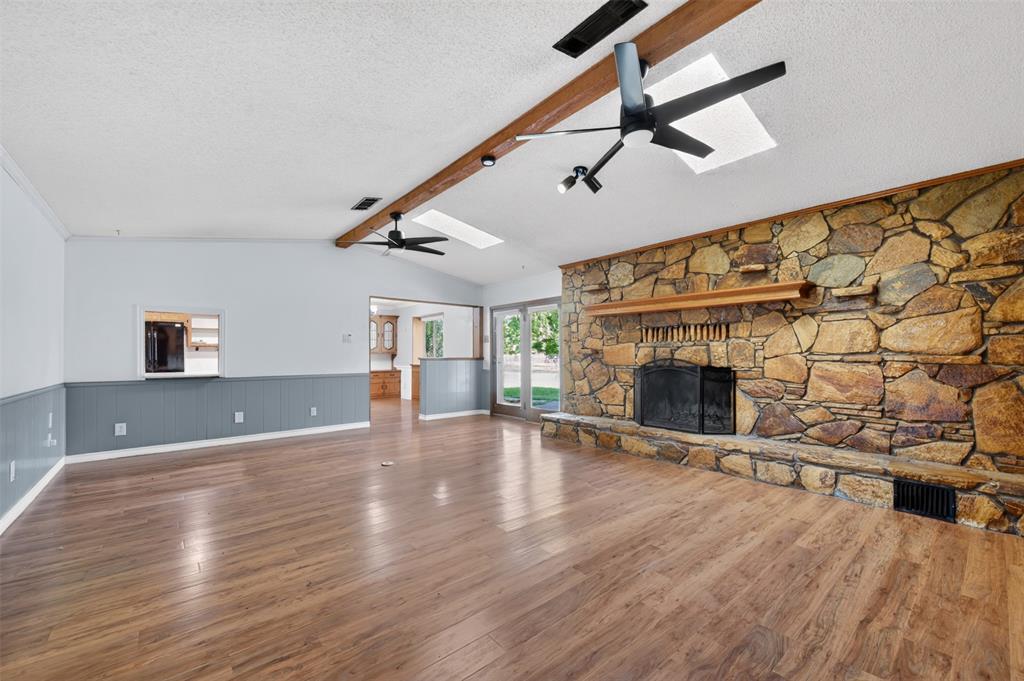 106 Snyder Ranch Road Trinidad, TX 75163 - Photo 12 of 40 Living room with massive stone wood-burning fireplace and lots of built-ins
