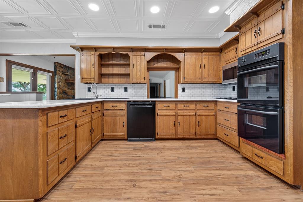 106 Snyder Ranch Road Trinidad, TX 75163 - Photo 14 of 40 The kitchen is at the heart of the home and has lots of counter space and tons of cabinets plus newer appliances and double ovens