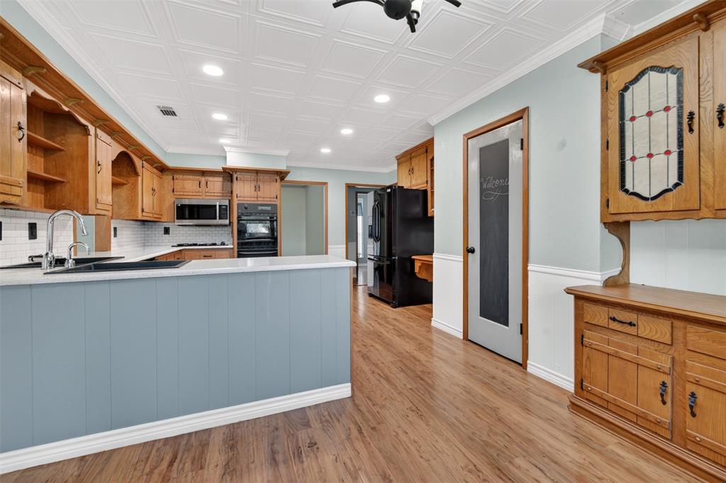 106 Snyder Ranch Road Trinidad, TX 75163 - Photo 16 of 40 View into the kitchen from the breakfast room. Note the large pantry