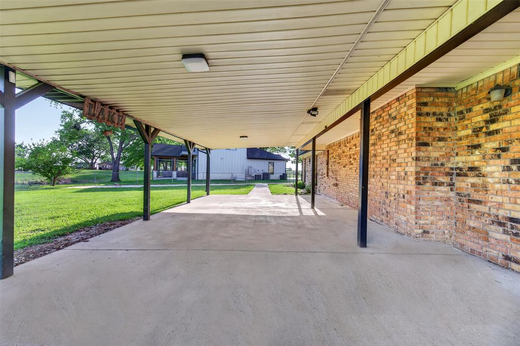106 Snyder Ranch Road Trinidad, TX 75163 - Photo 32 of 40 Huge covered patio looks out to the back yard