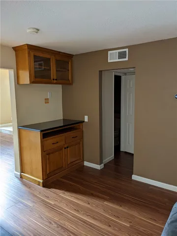 a living room with wooden floor