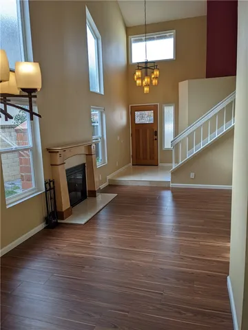 a view of a livingroom with furniture and a fireplace