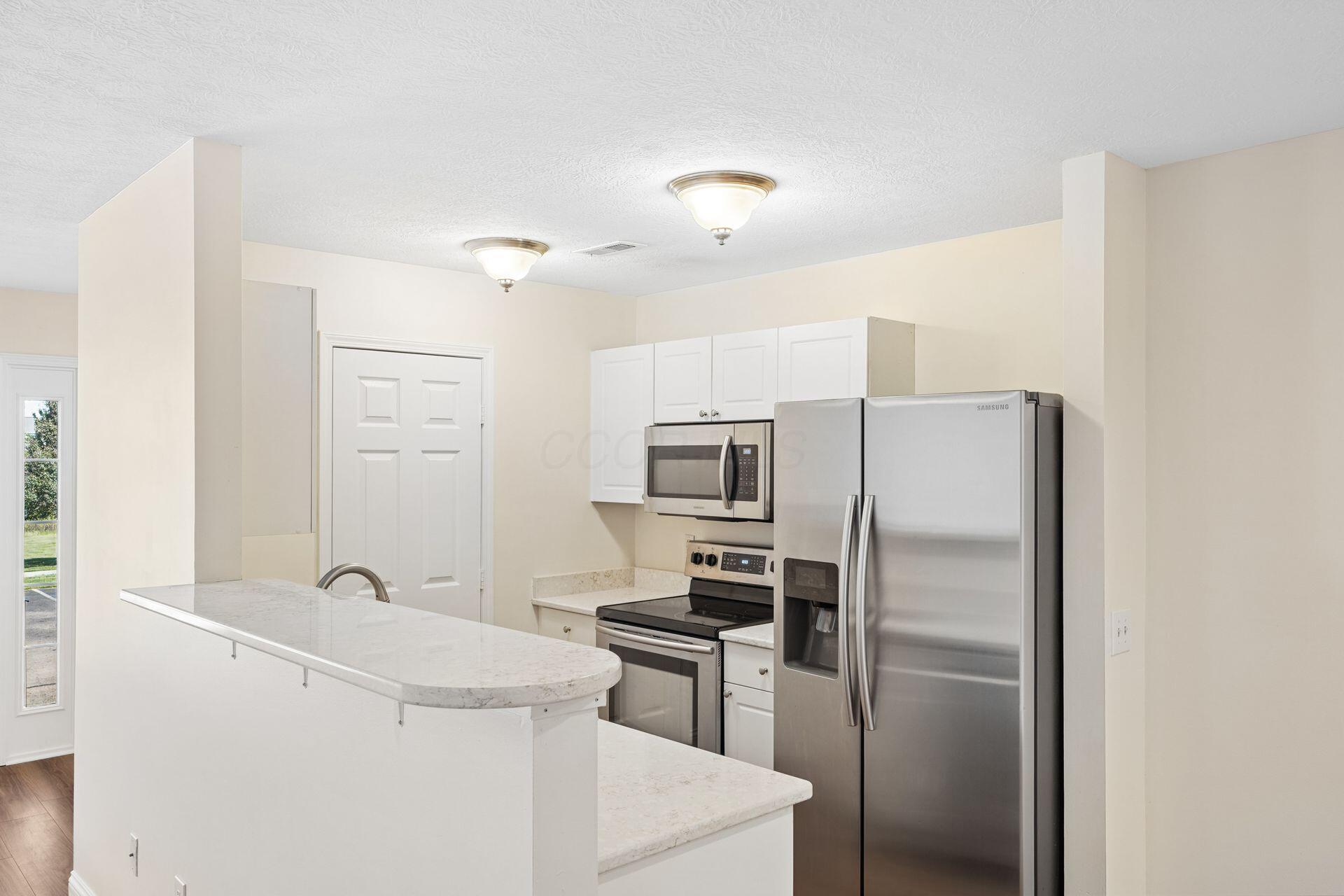 7003 Pleasant Colony Way, Unit 14 New Albany, OH 43054 - Photo 12 of 38 Kitchen