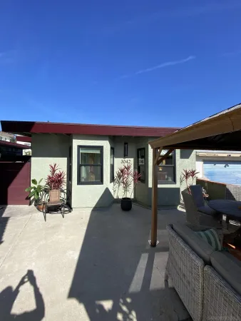 a front view of a house with patio