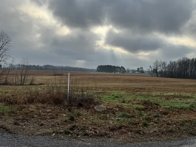 a view of a lake with a big yard