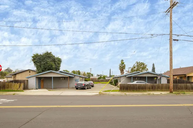 a view of a street with cars