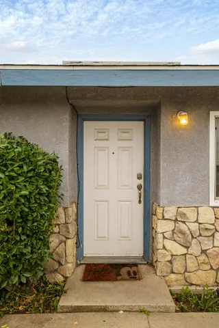 a house view with a garden space