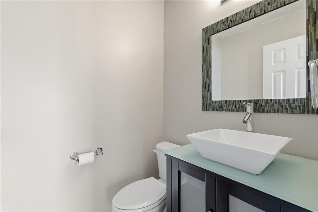 103 Ranch Trail Irving, TX 75063 - Photo 20 of 39 There is a guest powder bath down.