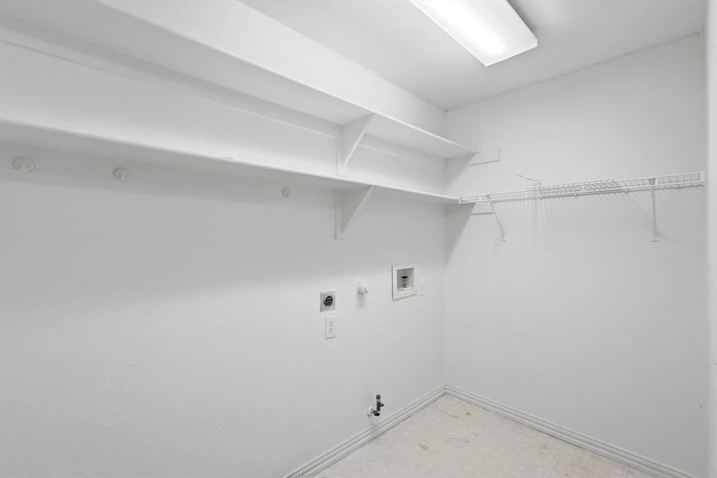 103 Ranch Trail Irving, TX 75063 - Photo 21 of 39 Large laundry room has room for a frig-freezer.