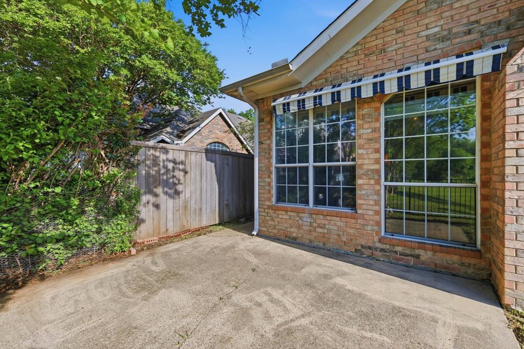 103 Ranch Trail Irving, TX 75063 - Photo 33 of 39 large patio with awning.