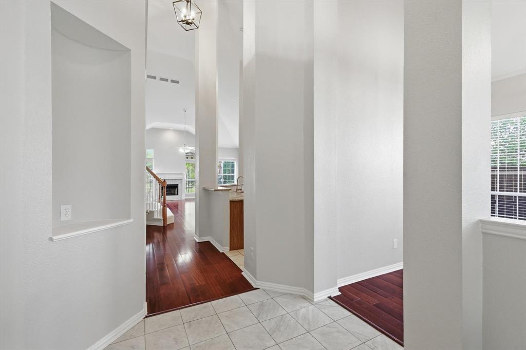 103 Ranch Trail Irving, TX 75063 - Photo 4 of 39 View upon entering with high ceilings and lots of natural light.