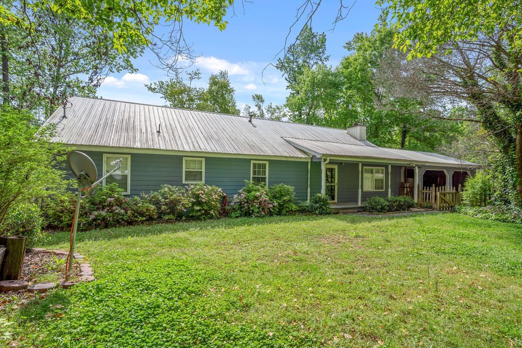 2820 Union Church Road Stockbridge, GA 30281 - Photo 1 of 1 a view of a house with a yard and potted plants